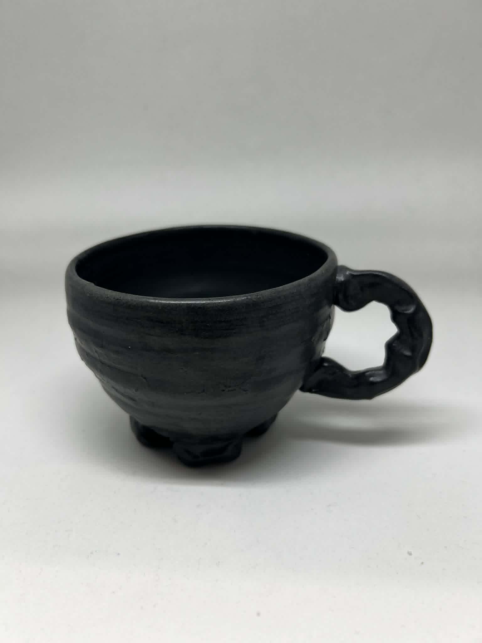 black on black mug